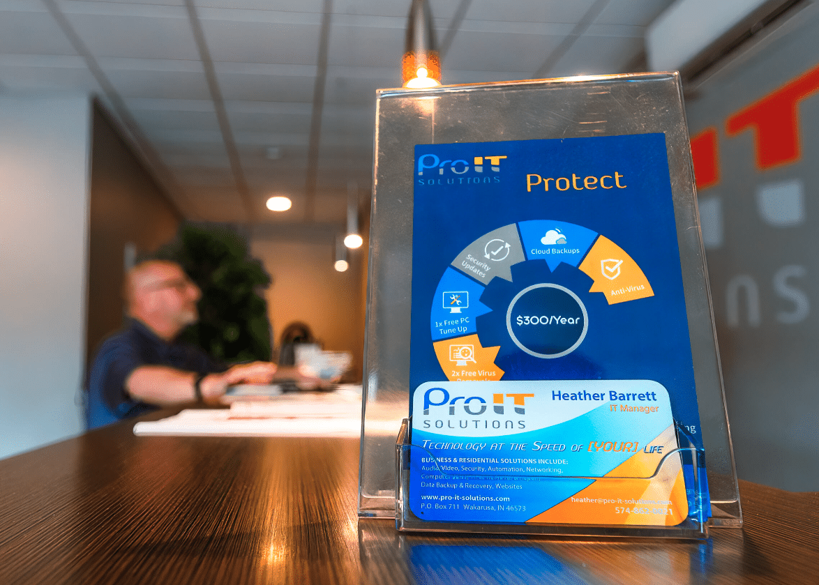 Business Partner Program Managed IT Flyer sitting on desk